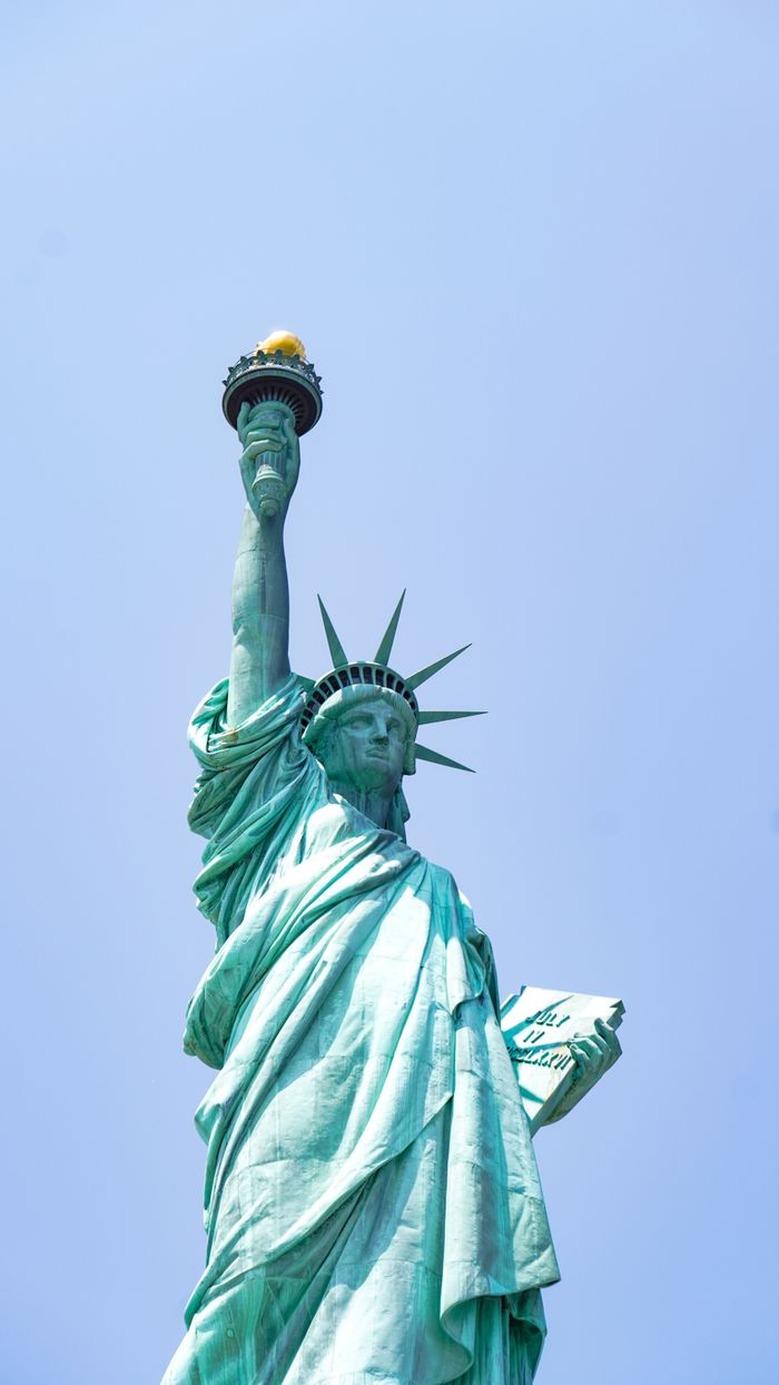 Crafting Captivating Headlines: Your awesome post title goes here Iconic Statue of Liberty with a clear blue sky in New York City, symbolizing freedom.